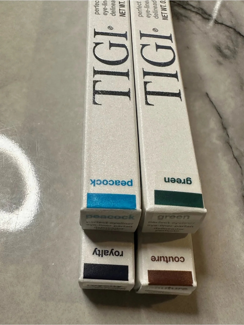 TIGI eyeshadow pallet,3 eyeliners,1 lipliner,glow blush, blush brush,foudation